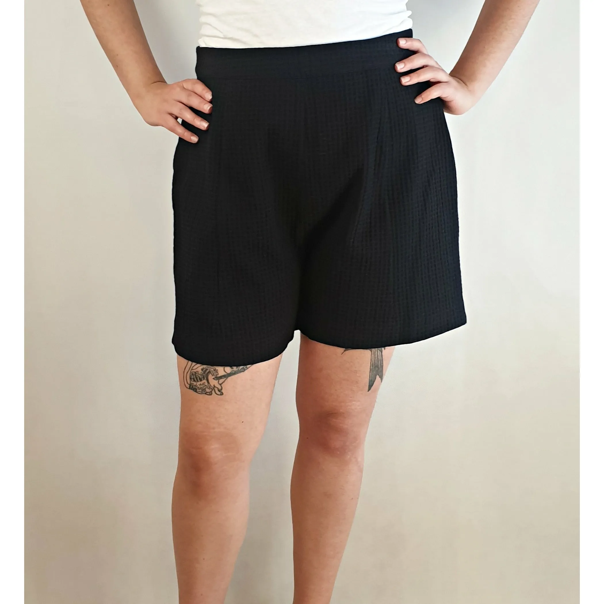 Alpha 60 second hand black shorts size M (best fits 12)