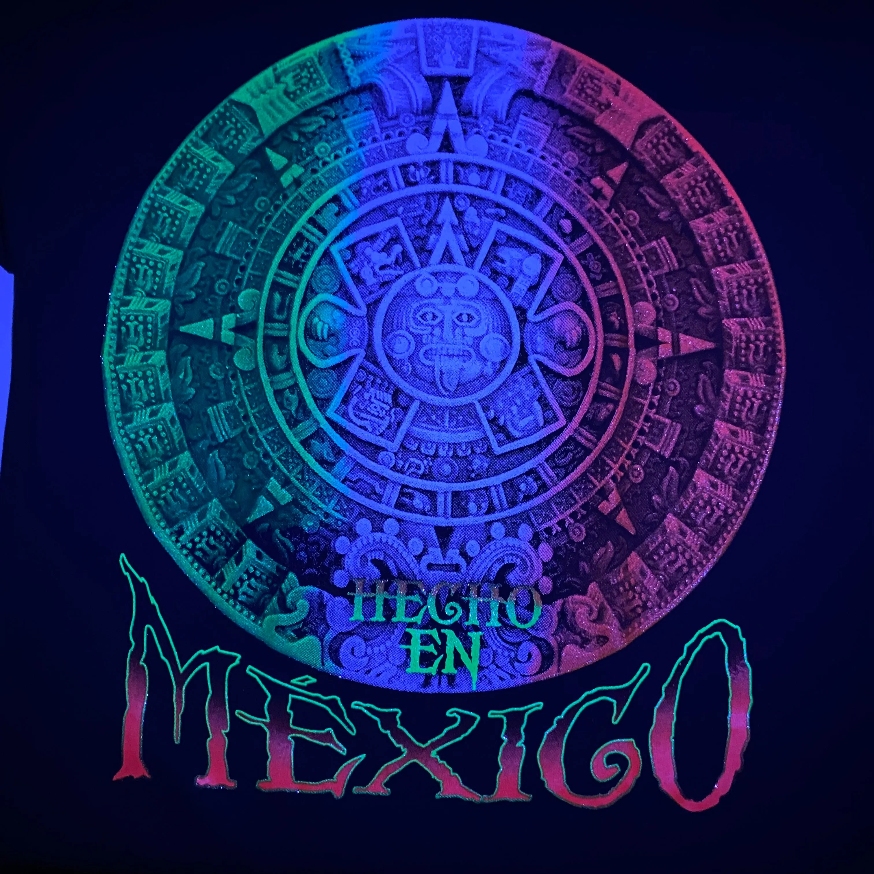 Black T-Shirt with Aztec Calendar Design that Glows Under Neon or Black light