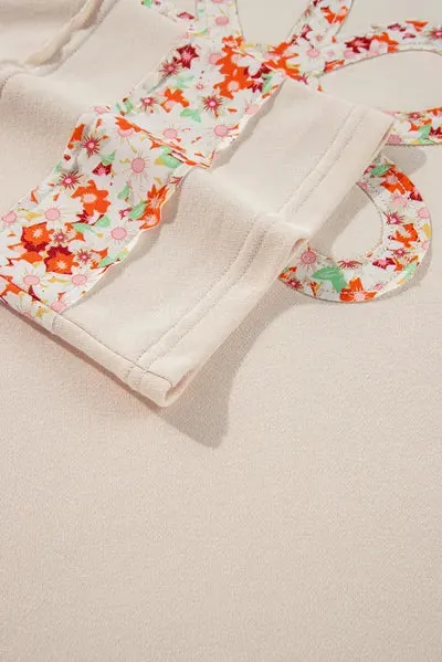 Exposed Seam Slit Floral Round Neck Blouse