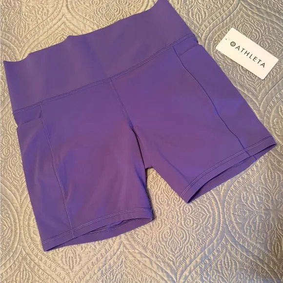 NWT ATHLETA SALUTATION STASH 7” shorts size large in purple
