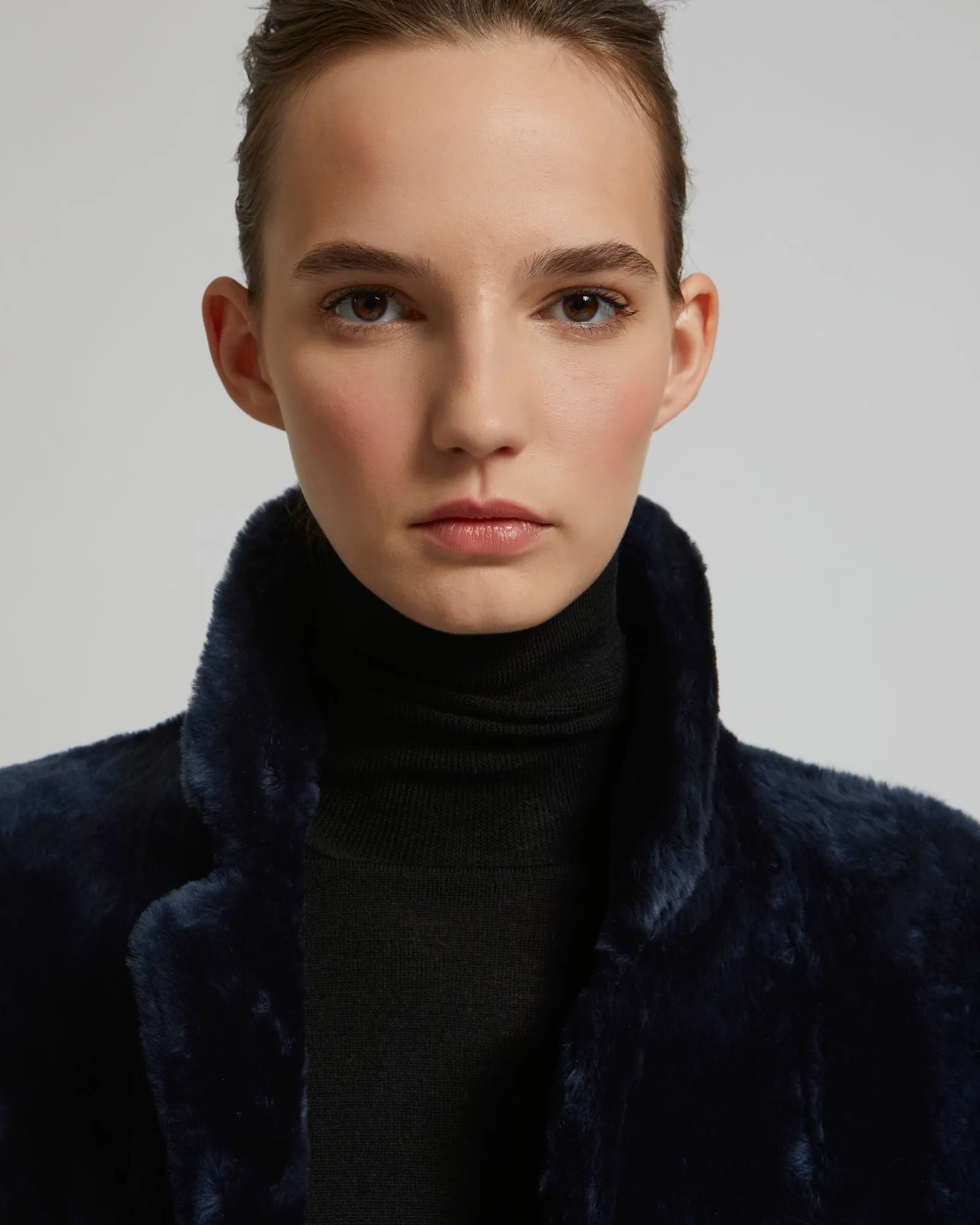 Reversible merino shearling coat