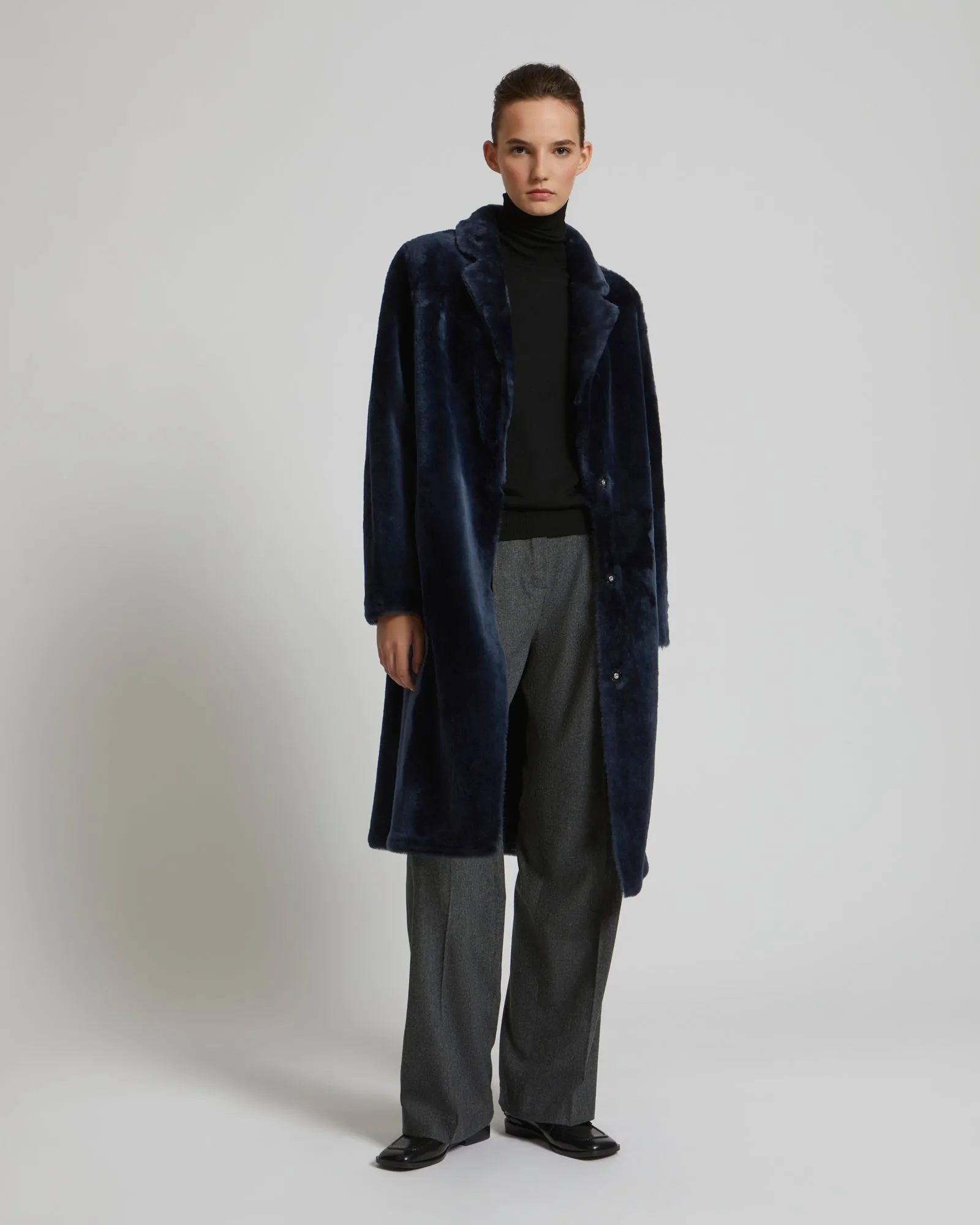 Reversible merino shearling coat