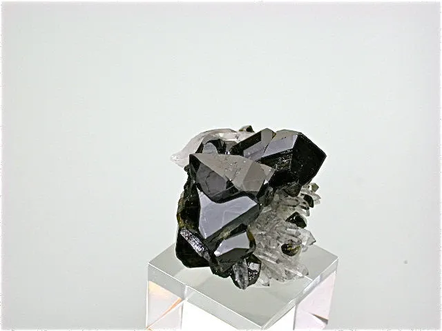 SOLD Cassiterite on Quartz, Viloco Mine, Loayza Province near La Paz, Bolivia, Miniature 2.0 x 3.0 x 4.0 cm, $300. Online 2/27.
