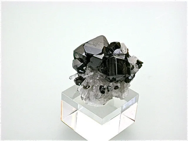 SOLD Cassiterite on Quartz, Viloco Mine, Loayza Province near La Paz, Bolivia, Miniature 2.0 x 3.0 x 4.0 cm, $300. Online 2/27.