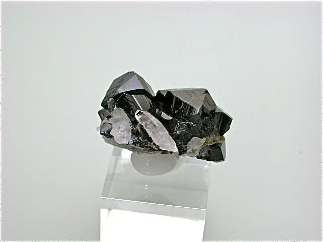 SOLD Cassiterite on Quartz, Viloco Mine, Loayza Province near La Paz, Bolivia, Miniature 2.0 x 3.0 x 4.0 cm, $300. Online 2/27.