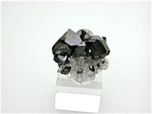 SOLD Cassiterite on Quartz, Viloco Mine, Loayza Province near La Paz, Bolivia, Miniature 2.0 x 3.0 x 4.0 cm, $300. Online 2/27.